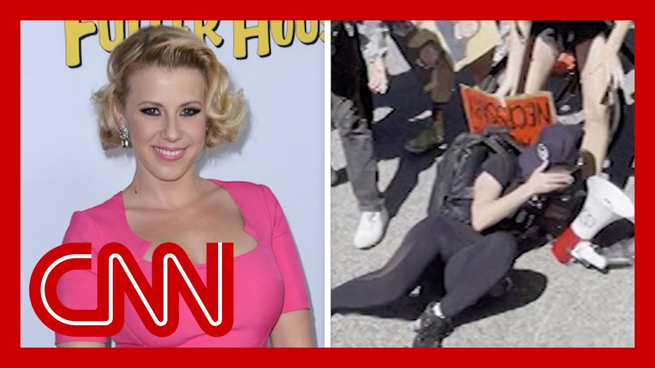 ‘Full House’ star describes being pushed to the ground during protest