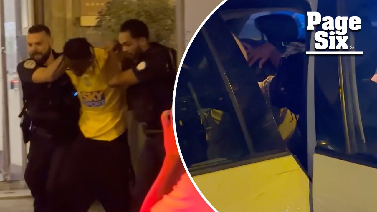 Dramatic video shows Travis Scott being dragged out of Paris hotel in handcuffs following arrest