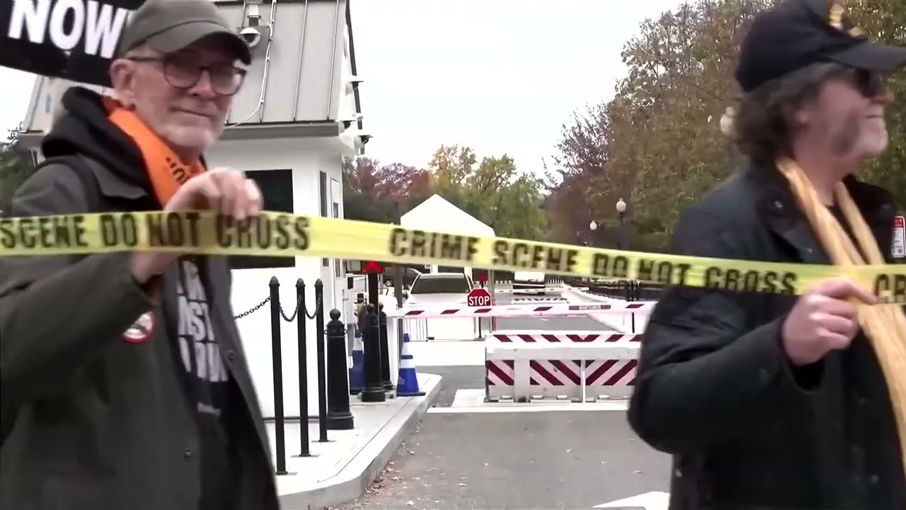 Protesters wrap ‘crime scene’ tape around White House perimeter | REUTERS