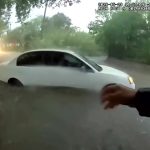 Bodycam captures officer rescuing baby from flood-trapped car