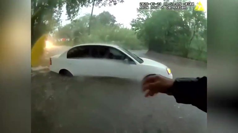 Bodycam captures officer rescuing baby from flood-trapped car